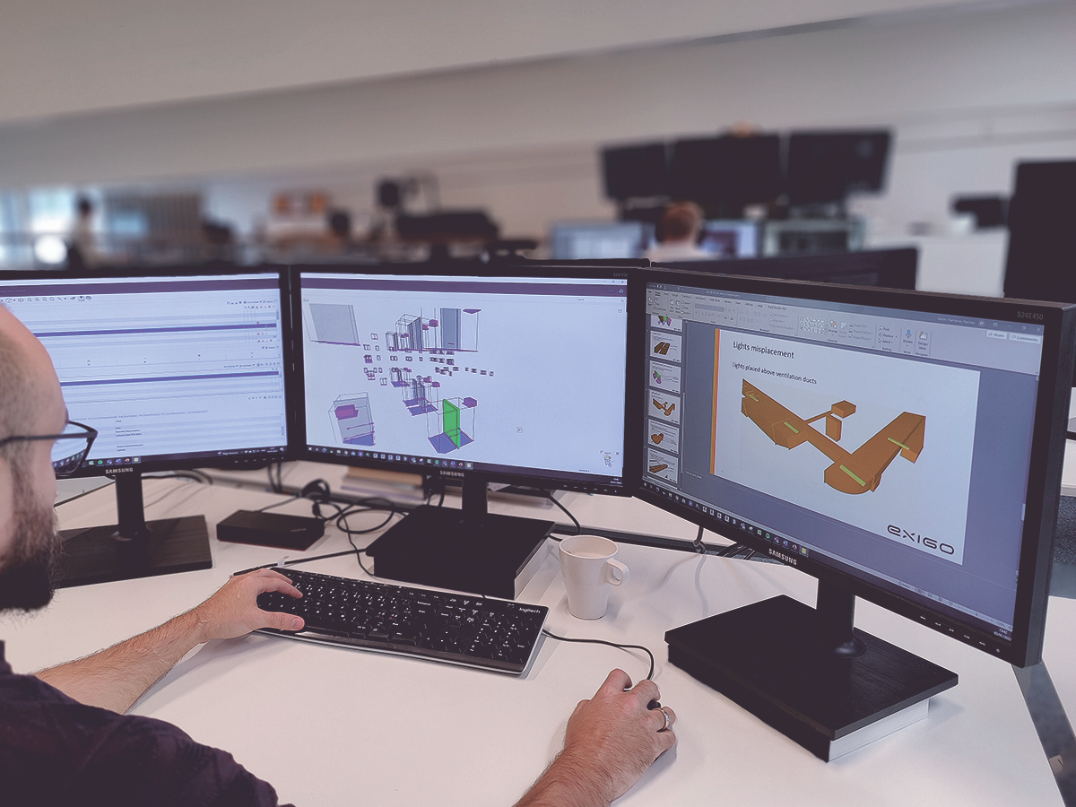 Employee at Exigo carries out collision control on a construction