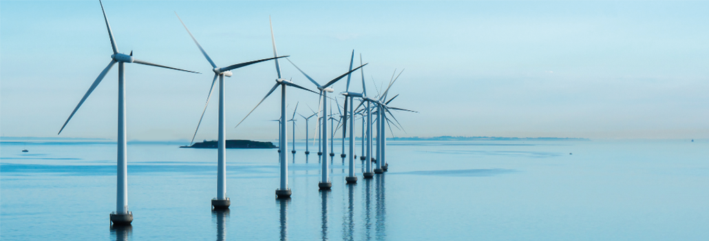 A row of offshore wind turbines
